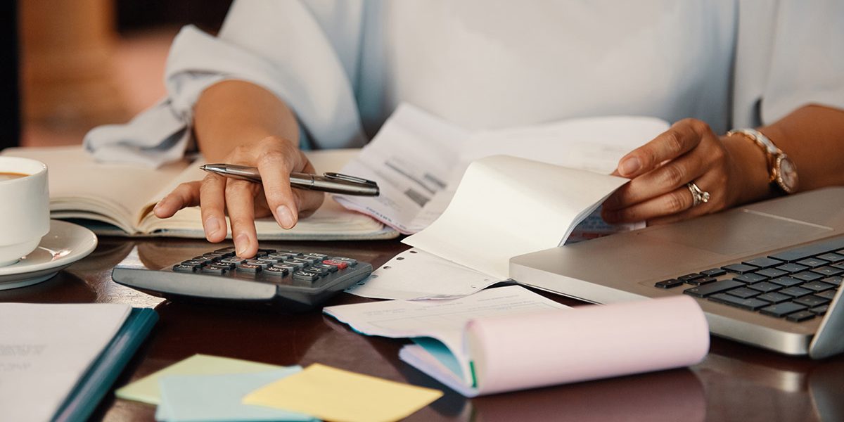 Entrepreneur working with bills