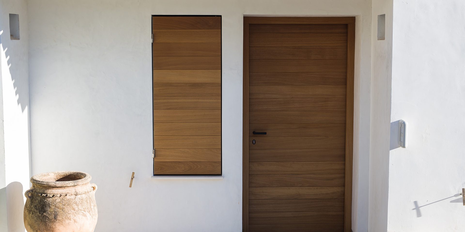 Windows shutters and door of a mediterranean house.