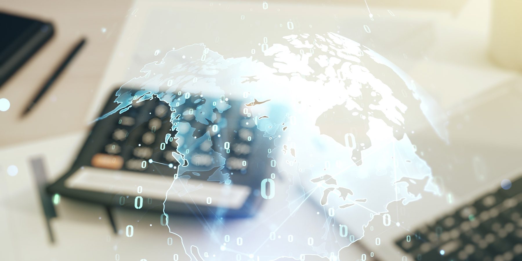 Abstract virtual coding concept and world map hologram on calculator and laptop background. Multiexposure