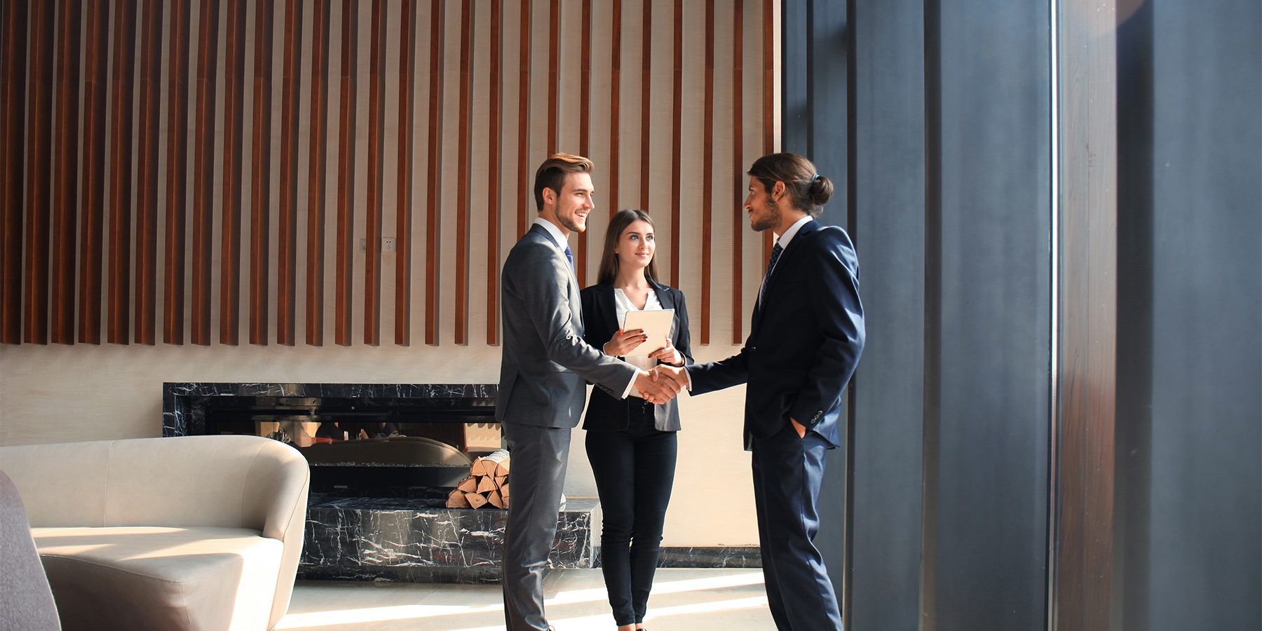 Business people shaking hands, finishing up a meeting