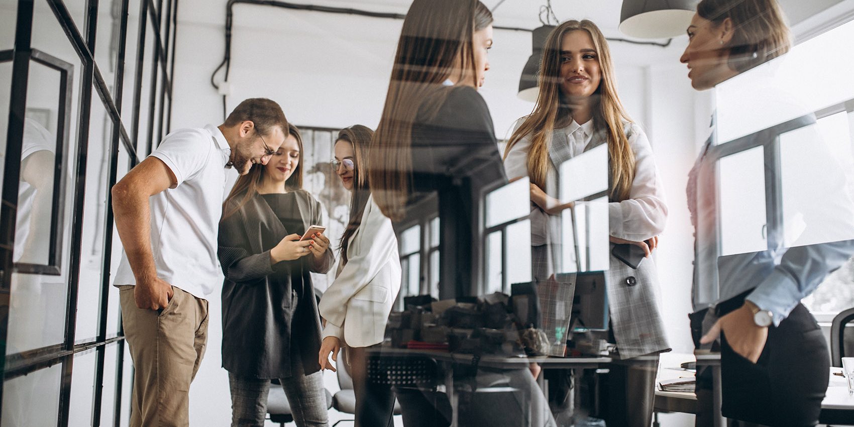 Group of people working out business plan in an office